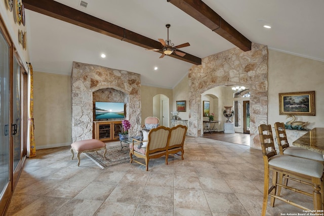 living room with arched walkways, ceiling fan, beamed ceiling, crown molding, and high vaulted ceiling