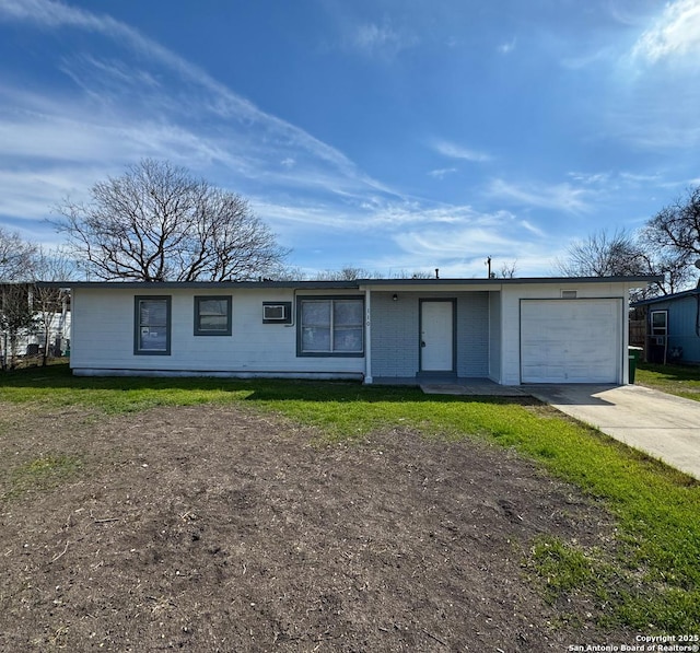 view of front of property with driveway and an attached garage