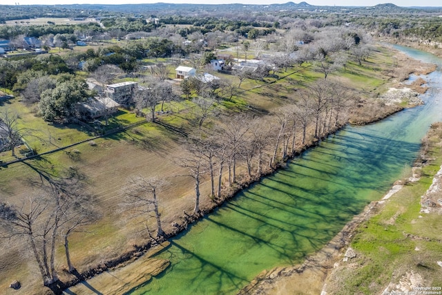 aerial view featuring a water view and a rural view