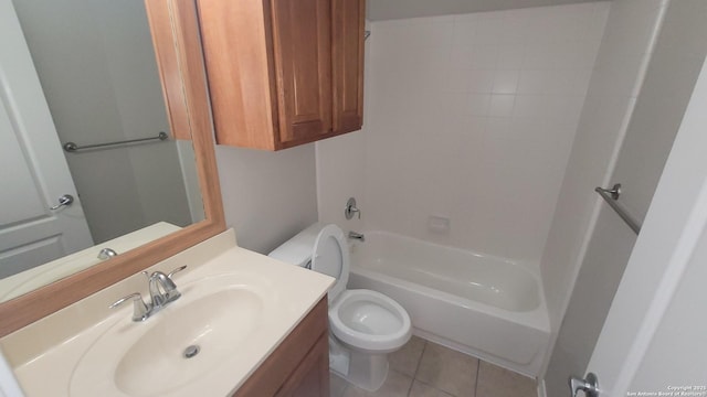 bathroom featuring toilet, vanity,  shower combination, and tile patterned floors