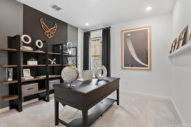 office space featuring light carpet, baseboards, visible vents, and recessed lighting