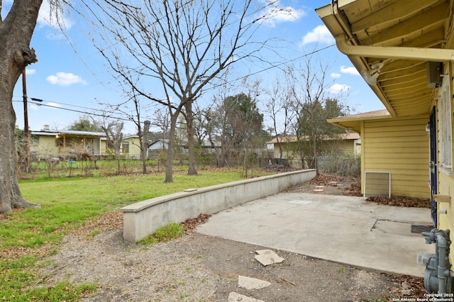 view of yard with a patio and a fenced backyard