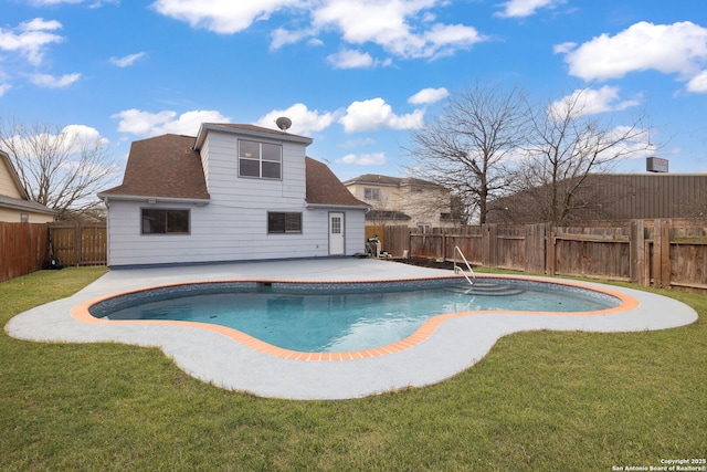 view of pool with a patio, a lawn, a fenced backyard, and a fenced in pool