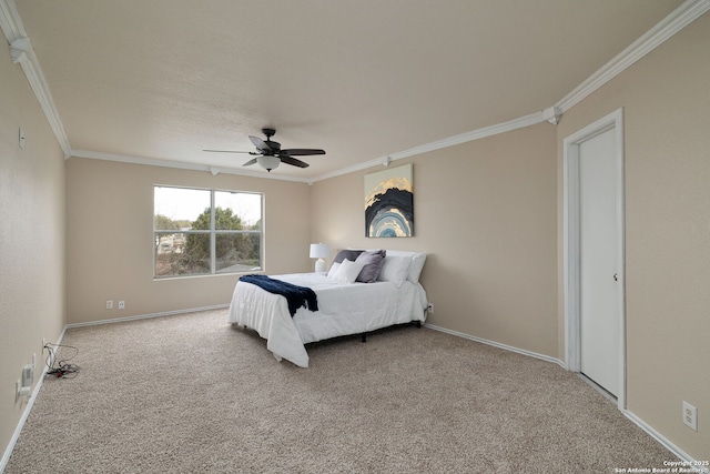 bedroom with light carpet, baseboards, a ceiling fan, and crown molding