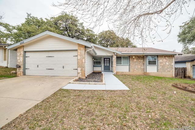 ranch-style home with an attached garage, stone siding, driveway, and a front lawn