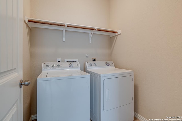 laundry area featuring laundry area and washer and dryer