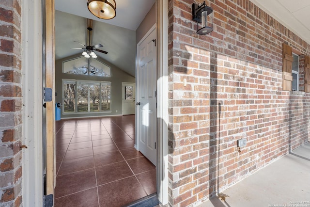 entrance to property with ceiling fan