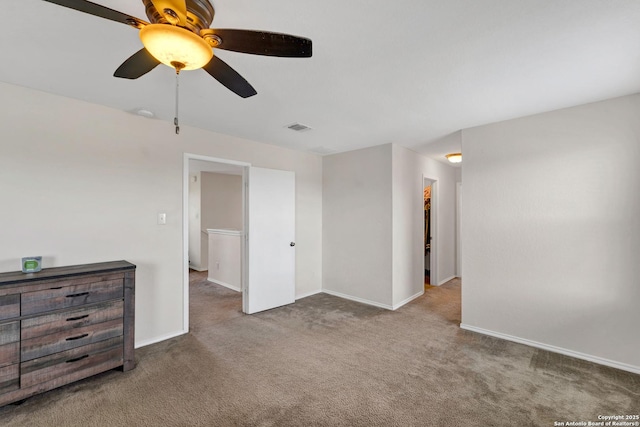 bedroom with ceiling fan, carpet floors, visible vents, and baseboards