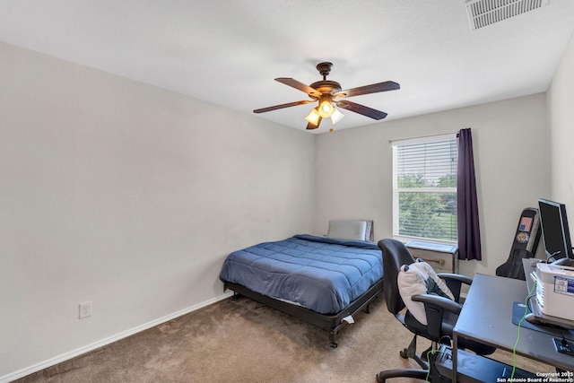 bedroom with a ceiling fan, carpet, visible vents, and baseboards