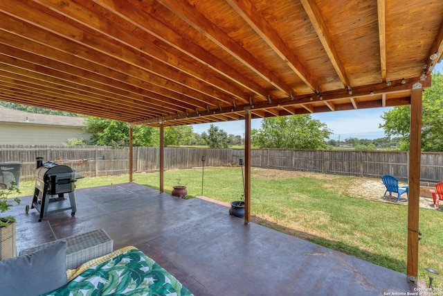 view of patio featuring area for grilling and a fenced backyard