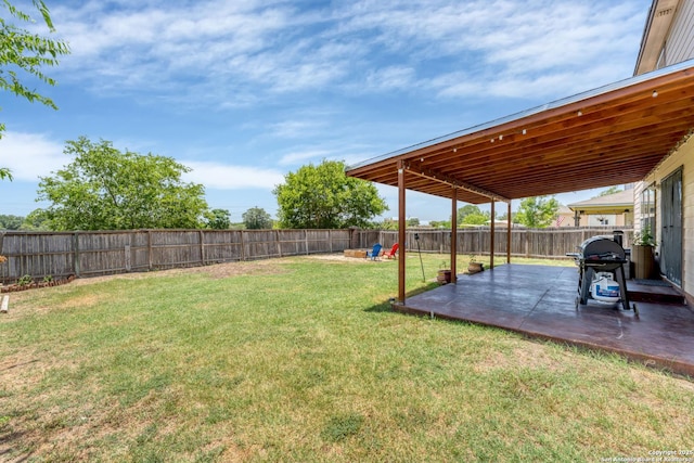 view of yard featuring a fenced backyard and a patio