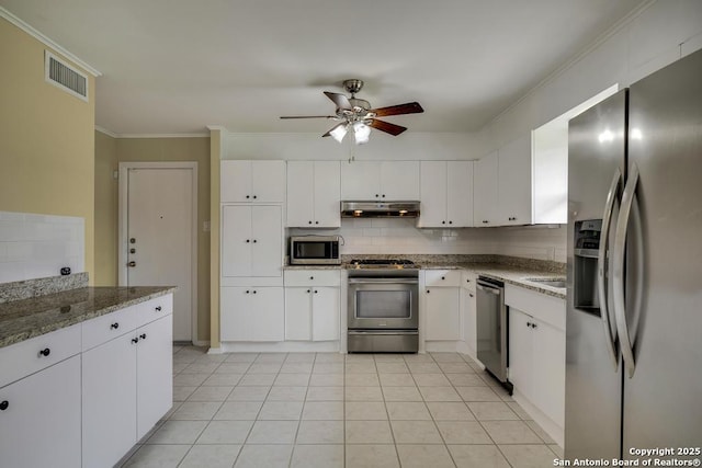 kitchen with visible vents, stainless steel appliances, white cabinets, and under cabinet range hood