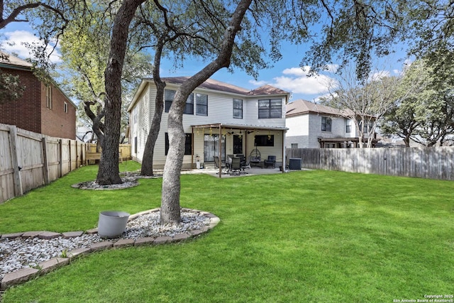 back of house with central air condition unit, a fenced backyard, a patio, and a yard