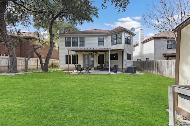 rear view of property featuring a patio area, a fenced backyard, a lawn, and central AC unit