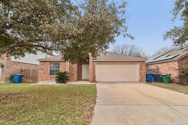 single story home featuring concrete driveway, an attached garage, fence, a front lawn, and brick siding