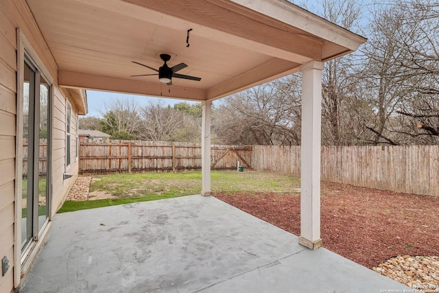 view of patio / terrace with a fenced backyard and ceiling fan