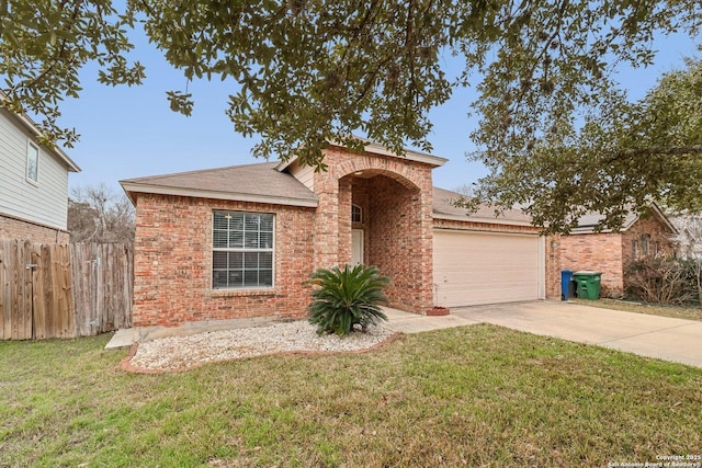 view of front facade with driveway, fence, a front lawn, and brick siding