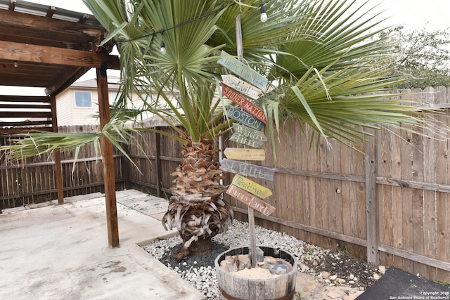 view of patio with fence