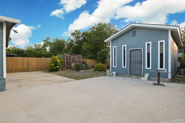 exterior space with a fenced backyard