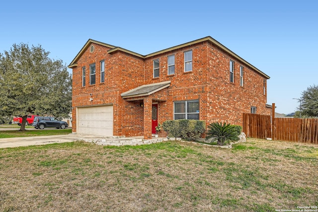 traditional-style home with brick siding, concrete driveway, a front yard, fence, and a garage