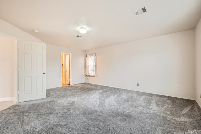 empty room featuring light colored carpet and visible vents