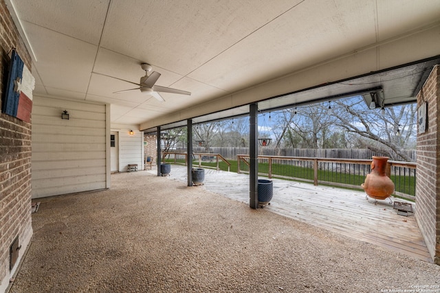 exterior space with ceiling fan and a wealth of natural light