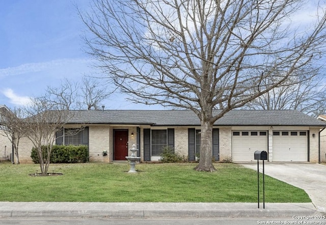 ranch-style house featuring brick siding, concrete driveway, roof with shingles, an attached garage, and a front yard