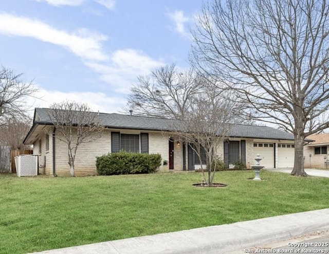 ranch-style house with a garage, a front lawn, concrete driveway, and brick siding