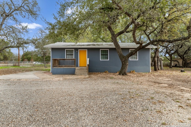 view of front of property featuring fence