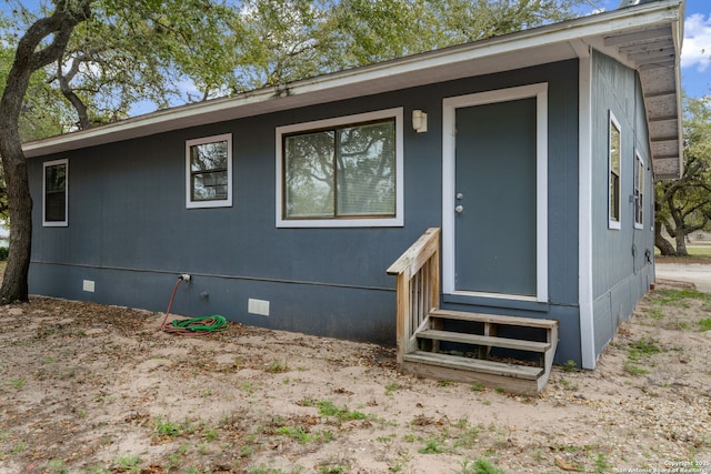 view of front of house featuring entry steps and crawl space