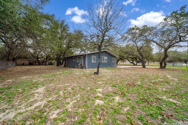 view of yard featuring fence