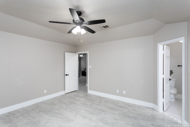 unfurnished bedroom with a ceiling fan, visible vents, connected bathroom, and baseboards