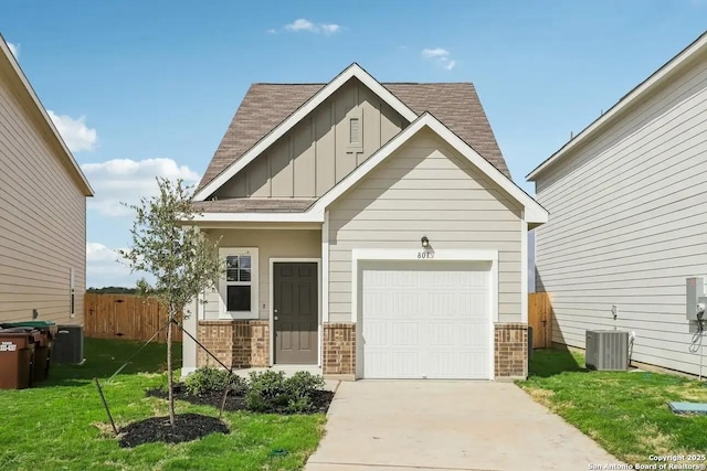 view of front of property featuring concrete driveway, brick siding, board and batten siding, and an attached garage