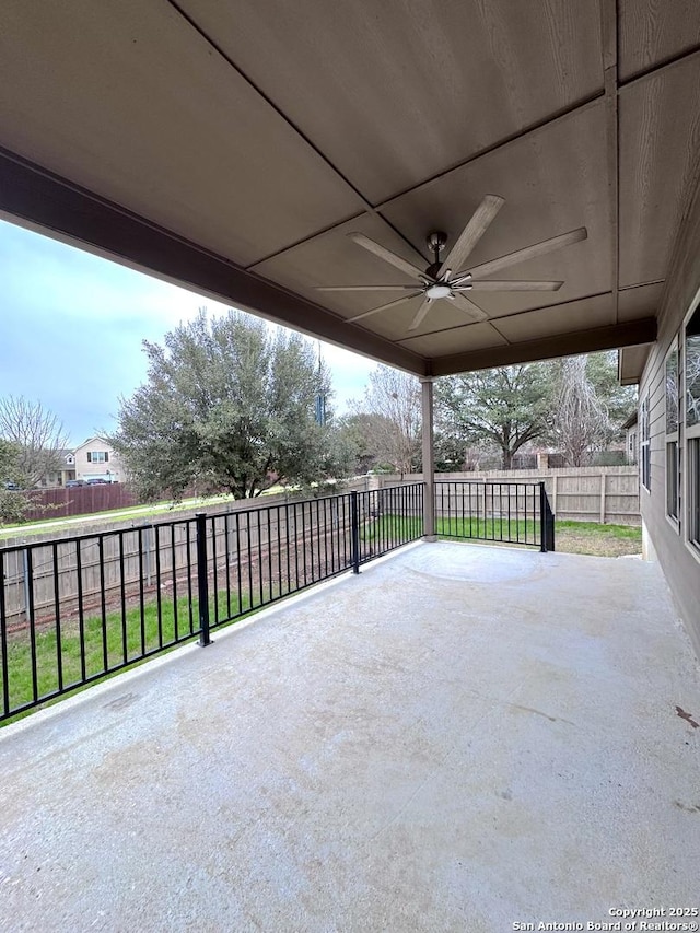 view of patio featuring a ceiling fan and a fenced backyard