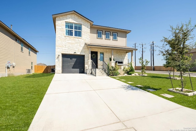 view of front of property featuring a front yard, concrete driveway, covered porch, and central AC unit