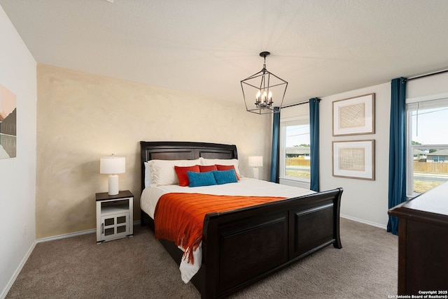 bedroom with light colored carpet, baseboards, and multiple windows