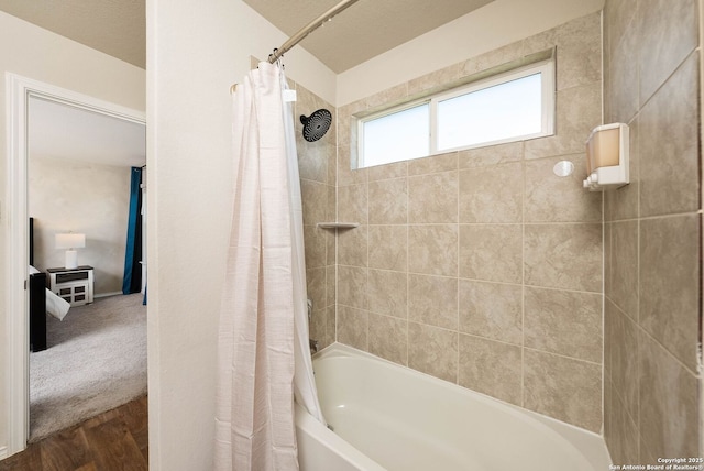 bathroom featuring shower / bath combo