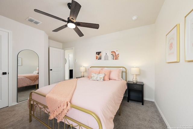 bedroom featuring baseboards, visible vents, ceiling fan, and carpet flooring