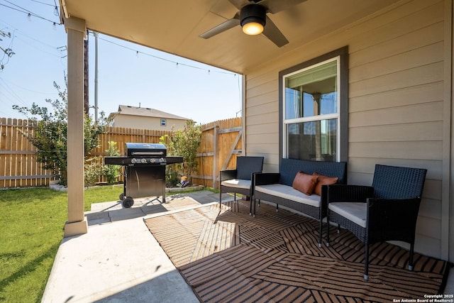 view of patio / terrace featuring ceiling fan, fence, and a grill