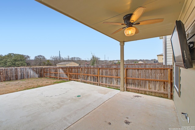 view of patio / terrace featuring a fenced backyard and a ceiling fan