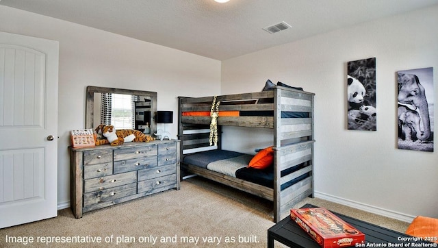 bedroom featuring light carpet, visible vents, and baseboards