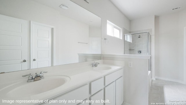 bathroom with a stall shower, visible vents, a sink, and double vanity