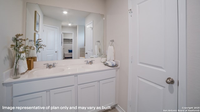 full bath with double vanity and a sink