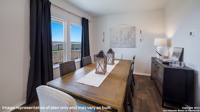 dining space with dark wood-style floors and baseboards