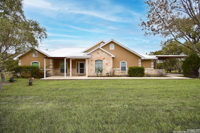 ranch-style home with stone siding, a front lawn, and stucco siding