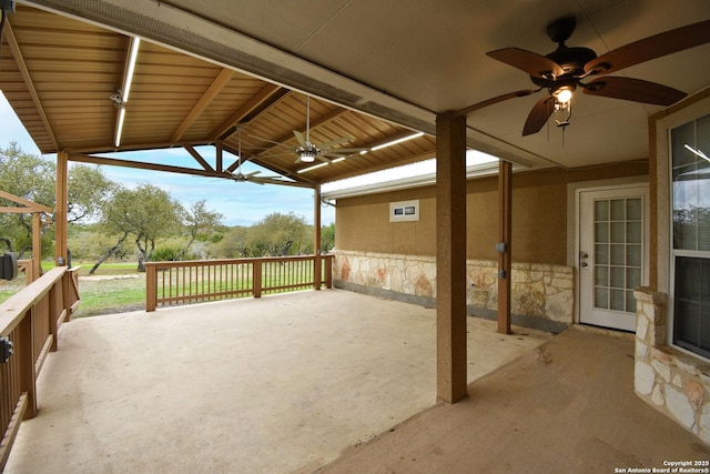 view of patio featuring ceiling fan