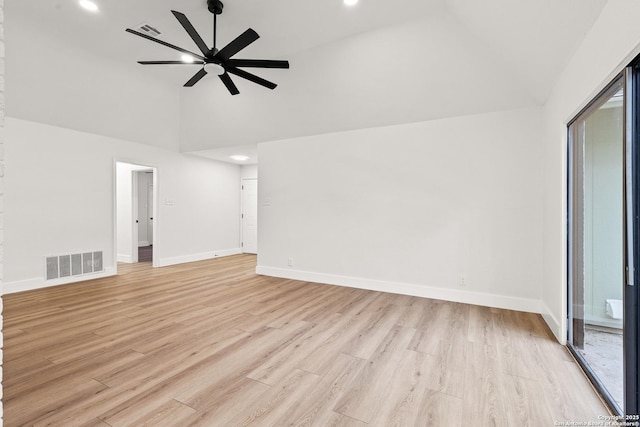 empty room with light wood finished floors, baseboards, and visible vents