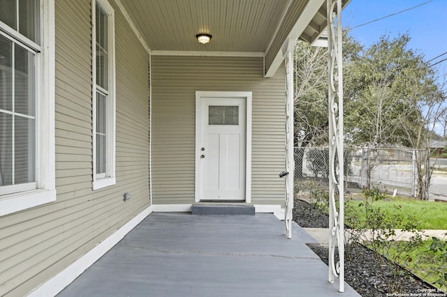 property entrance with fence