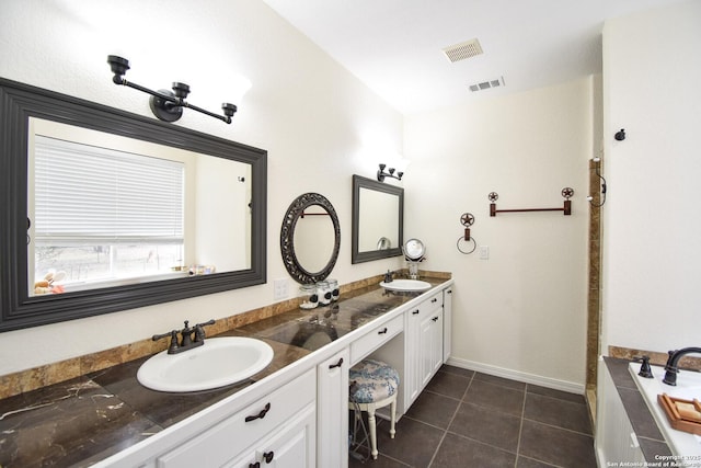 full bath with tile patterned flooring, visible vents, a sink, and double vanity