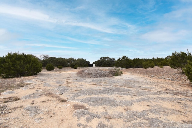 view of landscape with a rural view